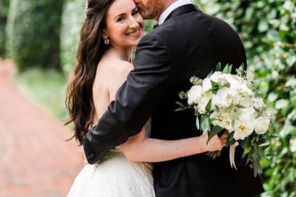 Groom kissing his bride