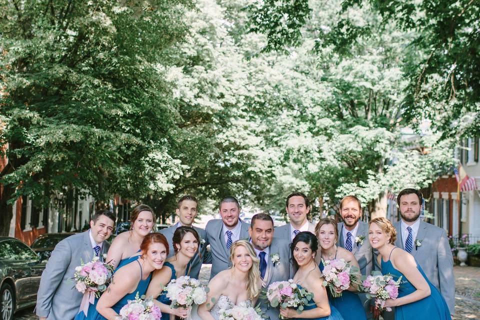 Newlyweds, bridesmaids, and groomsmen