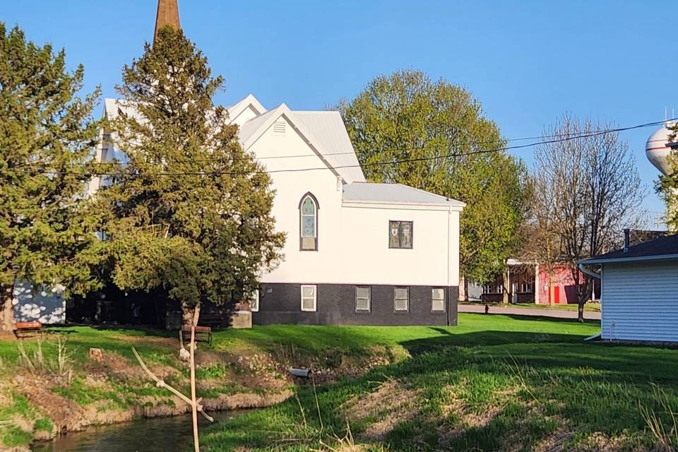 Behind the chapel with stream