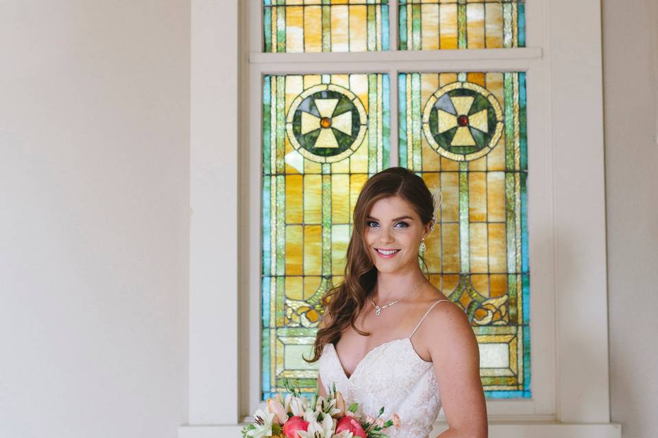 Bride at stained glass