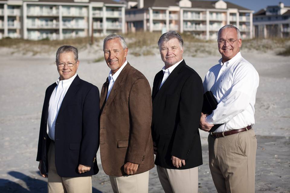 Four men at the beach