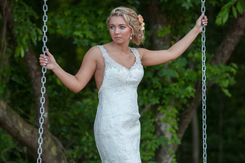 Bride riding the swing