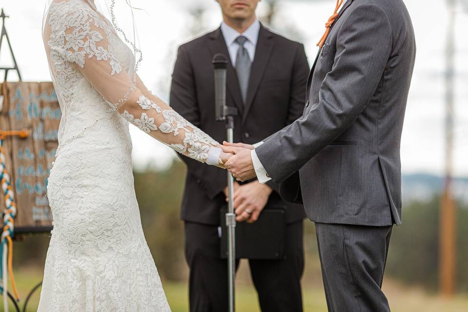 Hand Holding at Ceremony