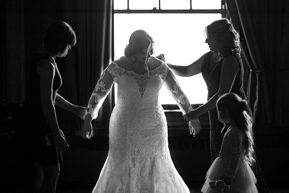 Bride Getting Into Dress