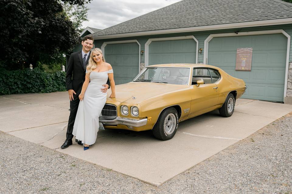 Wedding portrait with car