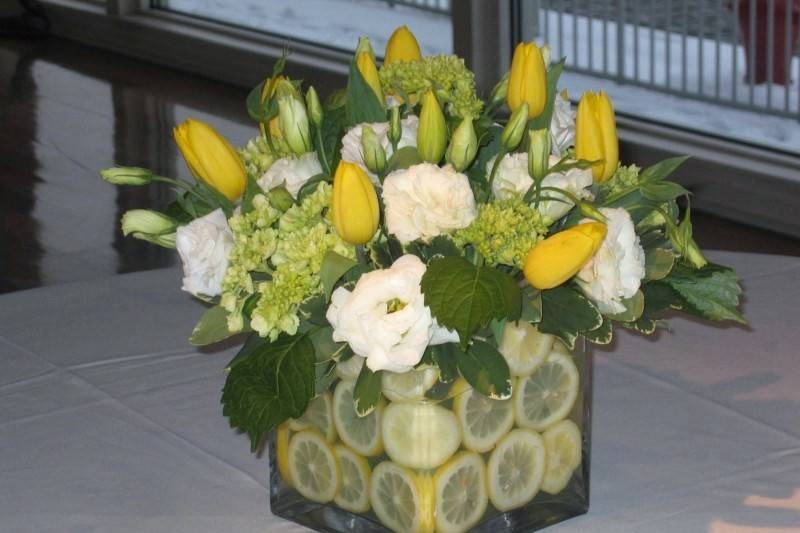 Flower centerpiece with orange blooms