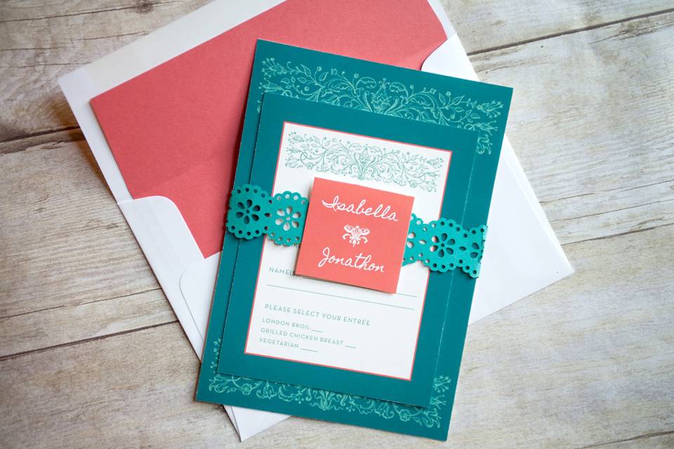 This beautiful invitation set features bright, bold colors and catches your eye at first glance. The rich blue's are offset by a subtle touch of pink. The design has renaissance elements that are  presented in a very modern way! A truly original look and design that is sure to impress your family and friends when it arrives in their mailbox!