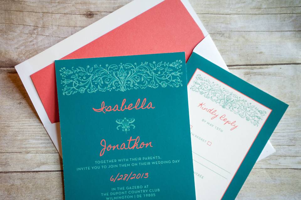 This beautiful invitation set features bright, bold colors and catches your eye at first glance. The rich blue's are offset by a subtle touch of pink. The design has renaissance elements that are  presented in a very modern way! A truly original look and design that is sure to impress your family and friends when it arrives in their mailbox!