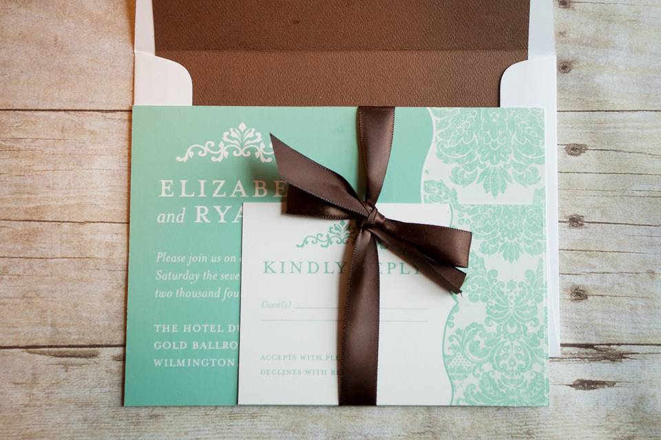 This elegant Tiffany's inspired aqua and brown damask is a modern twist on a classic design! Base your theme around this look and will will not be disappointed.This beautiful invitation is sure to catch your guests attention and showcase your  style and impeccable taste!