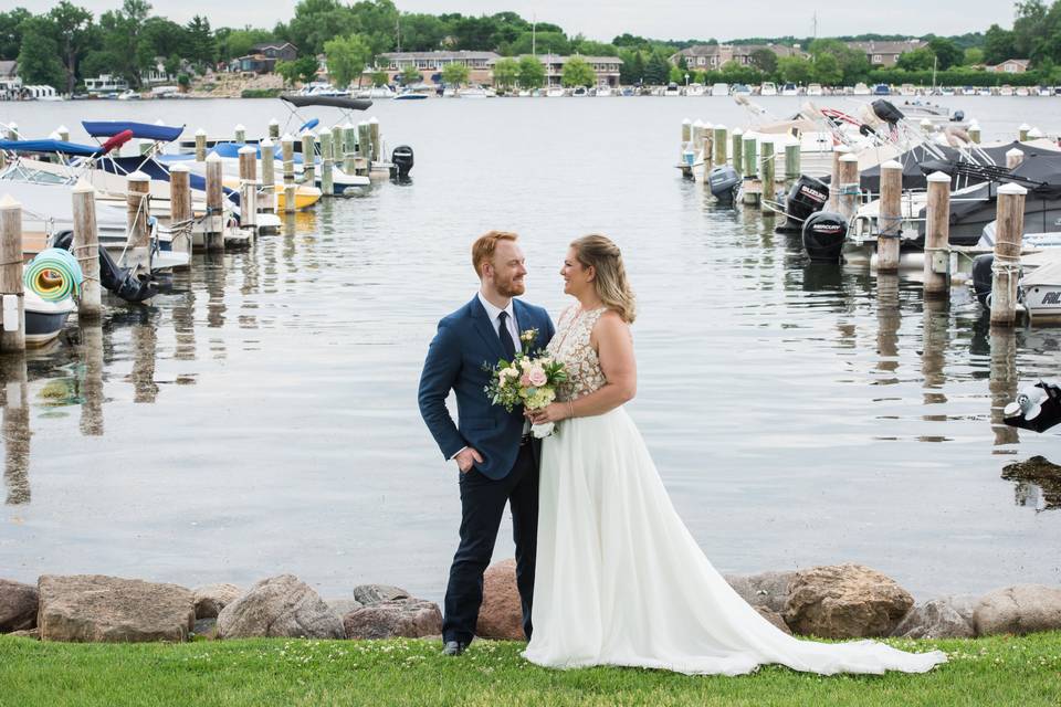 Couple next to boats