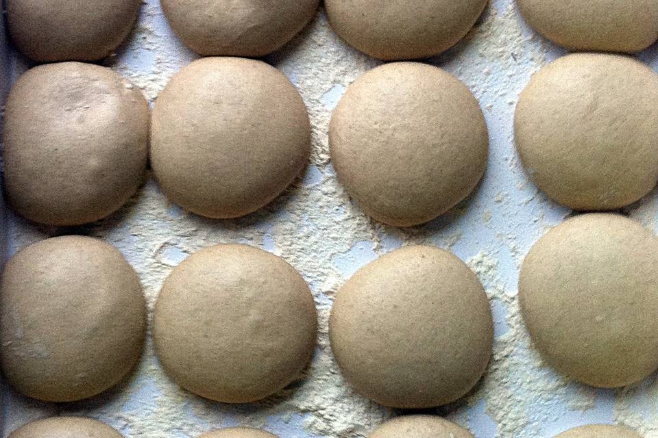 We make our dough from a blend of locally-milled organic whole wheat and unbleached white flour, then cold ferment the dough balls for 24 - 48 hours to create a tender, sweet crust.