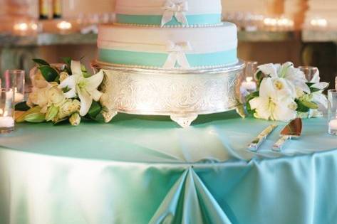 Tiffany blue and white cake with sugar stephanotis on top