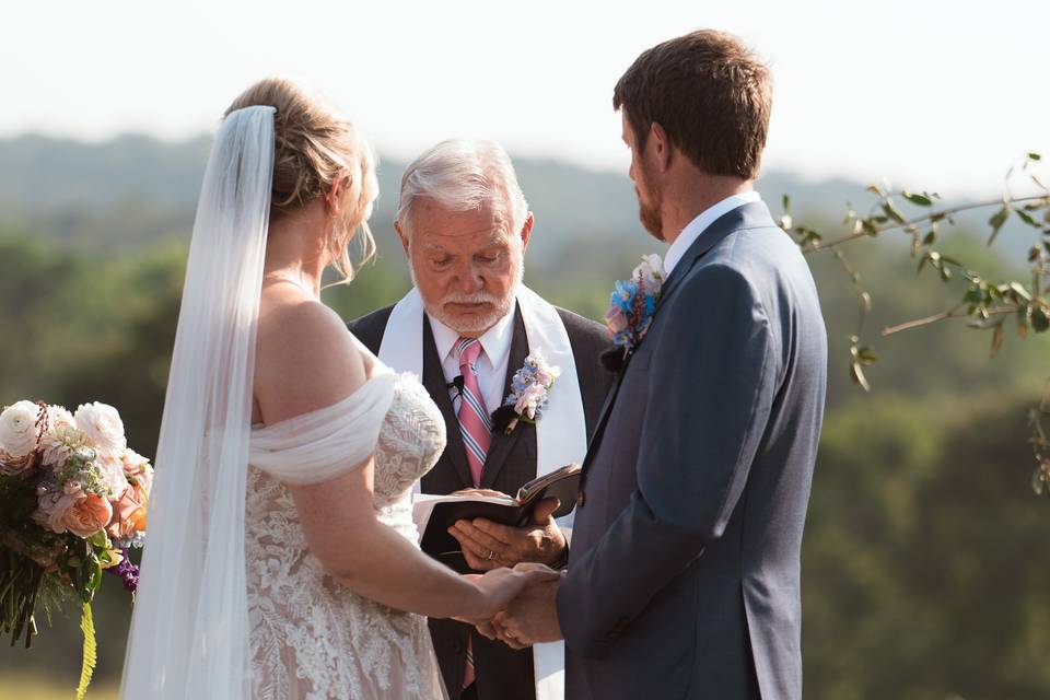 Bride and Groom at altar
