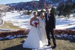 Newlyweds with the officiant