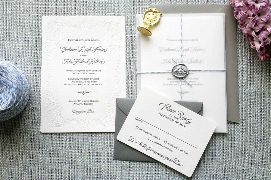 Custom letterpress wedding invitations with wax seal.