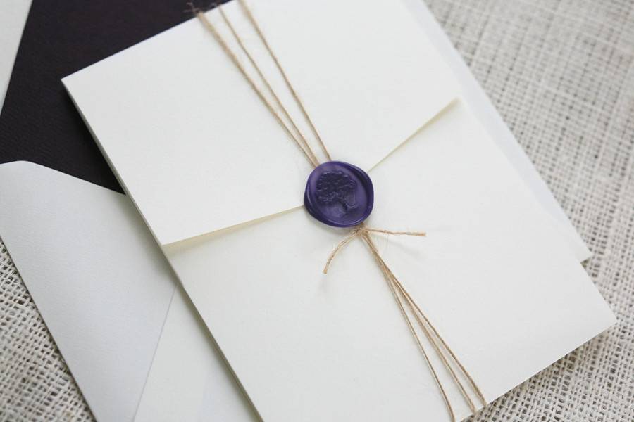 Custom wedding invitation with wax seal.