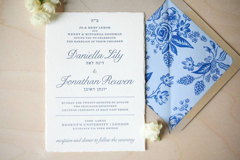 Garden wedding invitation suite in letterpress with deckled edges and floral envelope liner.