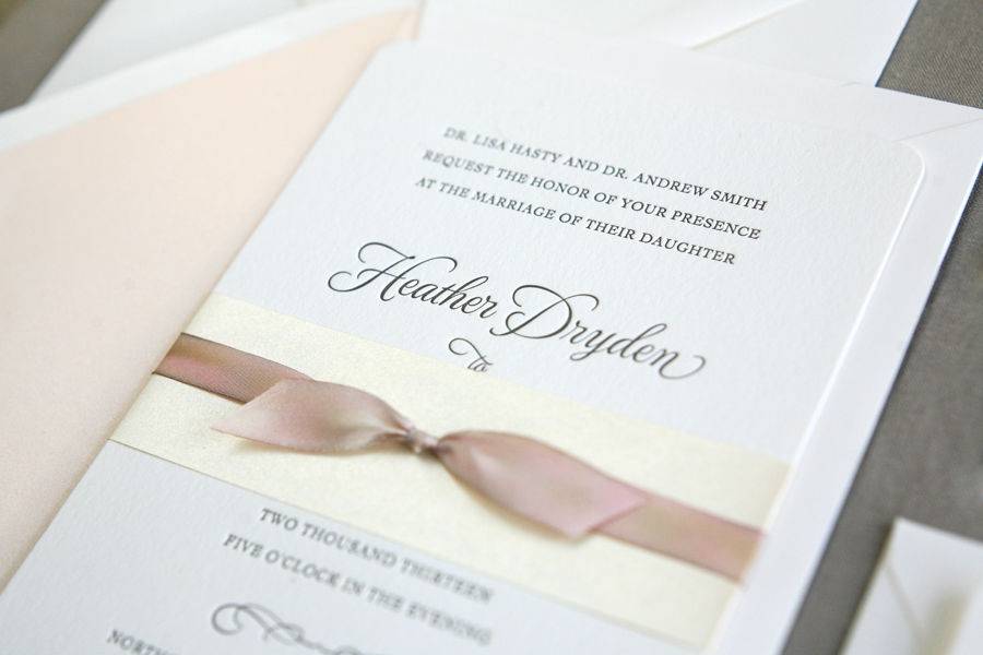 Classic letterpress wedding invitation with hand-dyed silk ribbon.