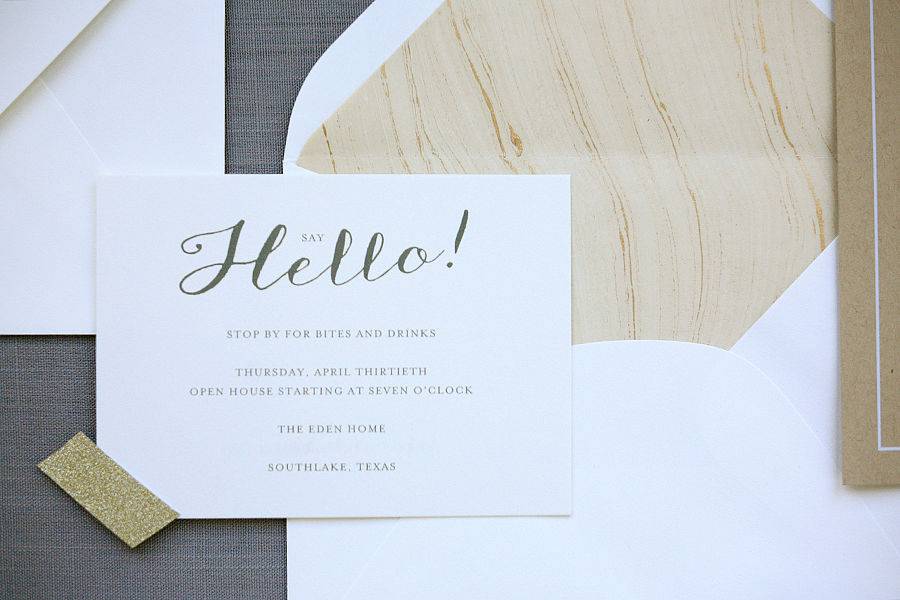 Whimsical wedding invitation suite in gold and grey.