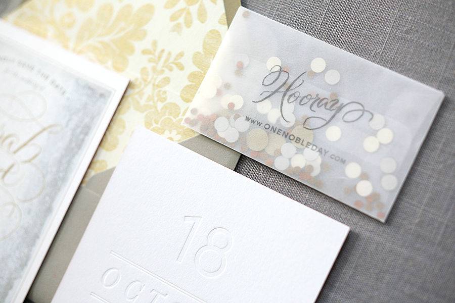 Modern save the date with confetti.