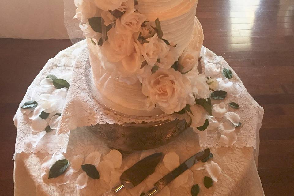 White cake with ascending flowers