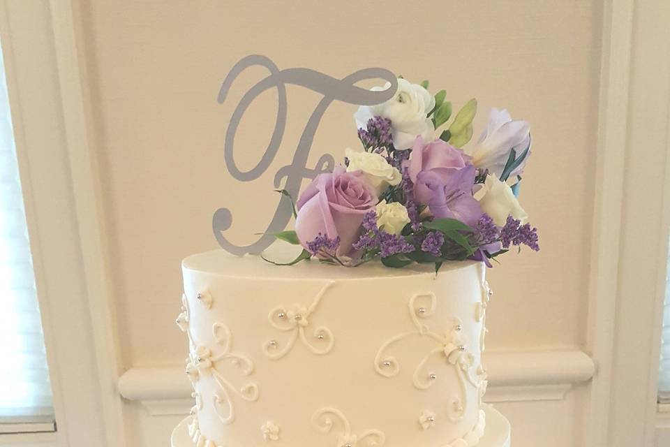 Simple white cake with patterned texture