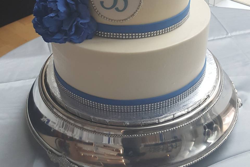 White cake with blue bands
