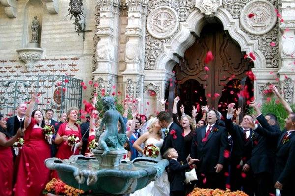 The Mission Inn sets the backdrop for this romantic red and white wedding