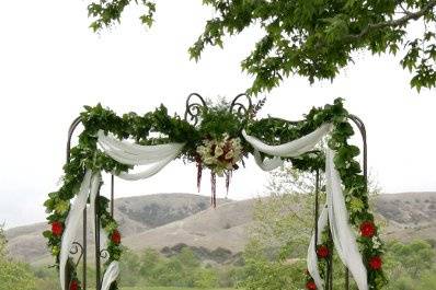 Our Signature silk draping with hand made fresh garlands As Featured in Florists Review Magazine Sept.2008