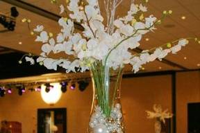 5ft. tall displays of orchids and crystal ornaments grace the tables for this Gala Winter event