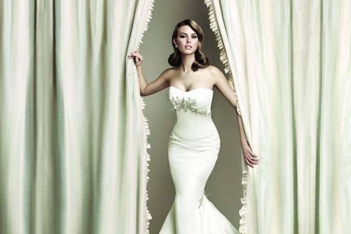 7082
Gown features Swarovski crystals.