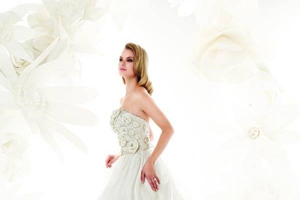 90004
Gown features florette detailing.