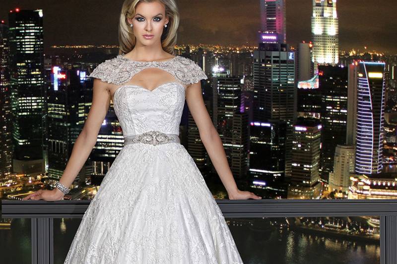 90177	<br>	THIS FAIRYTALE BALL GOWN WITH SWEETHEART NECKLINE ADRONED WITH SWAROVSKI CRYSTALS BEADED BELT, STUNNING DETACHABLE HAND BEADED BOLERO COMPLIMENT THIS SPECTACULAR GOWN