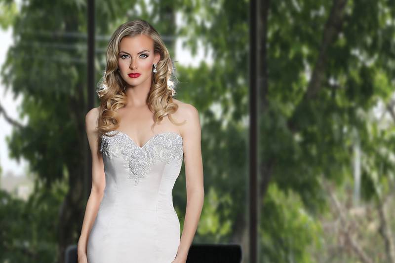 Simone Carvalli	Style	90219	<br>	Gorgeous embroidered beading delicately lays on the sweetheart neckline, and dance along the fit and flare skirt.