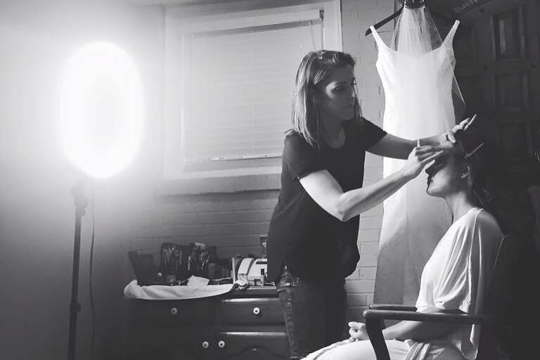 Bride getting her makeup done