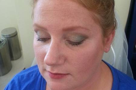 Basic Bridal Application. Used all mineral cosmetics. Client requested a pop of green in her eyeshadow as her accent color from the wedding.