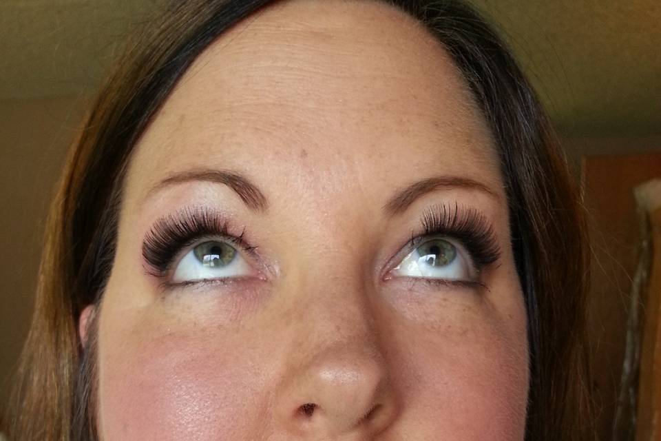 lashes enhanced with fiber lash system and a strip lash application