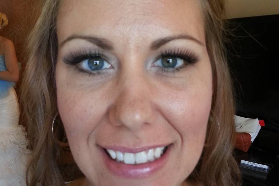 Airbrush Bridal Application. Greys and green eyeshadows. Full band lash application.