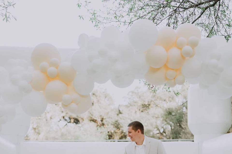 Couple in a White Bounce House