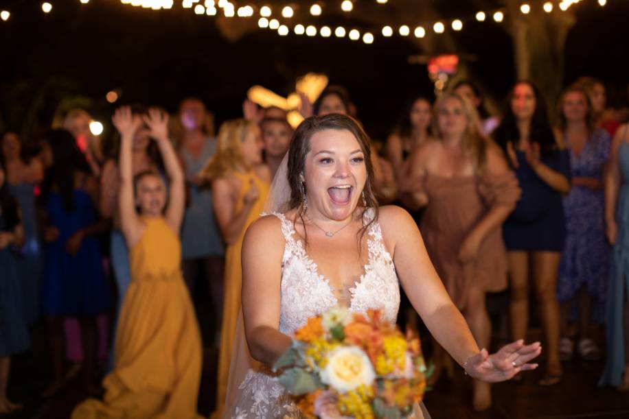 Bride tossing her bouquet