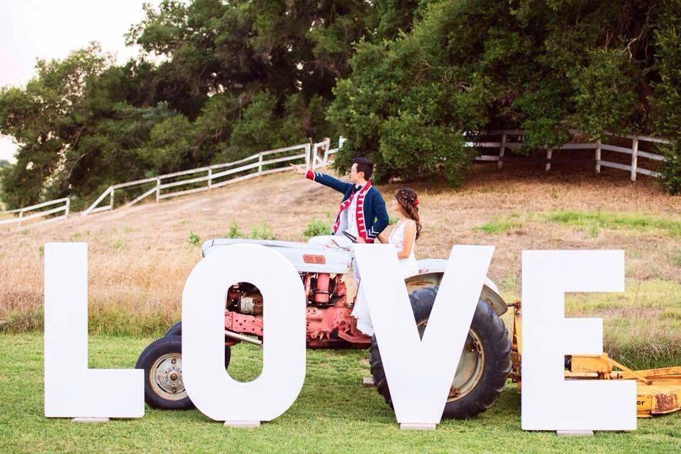 Love signage and tractor
