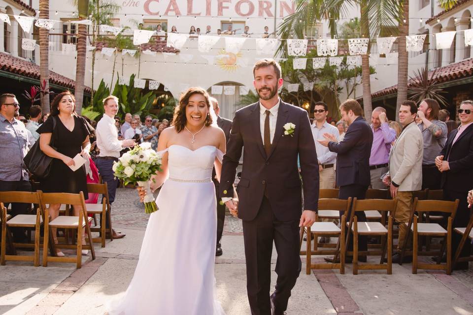 Newlyweds walk down the aisle