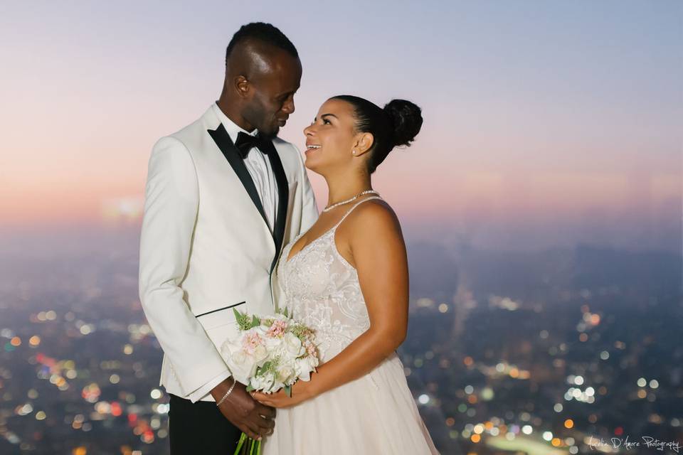 Newlyweds with a city view