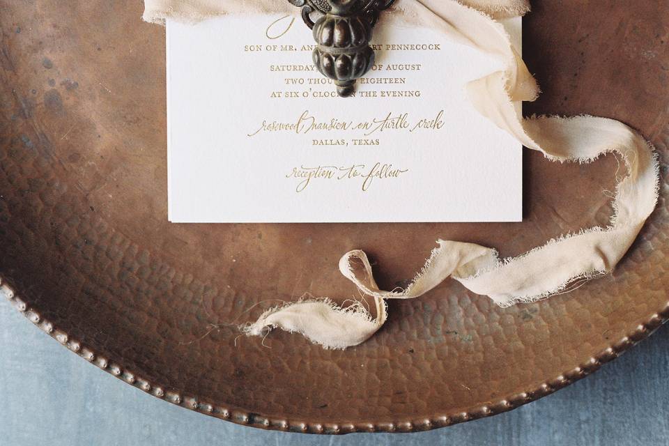 Invites with gold detailing