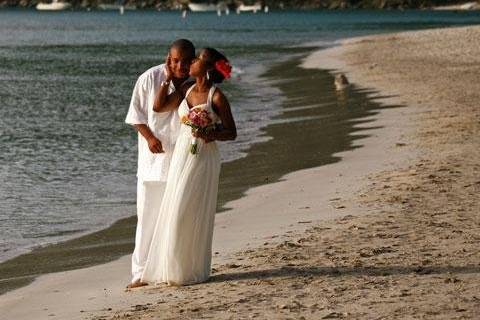 Groom kissing his bride