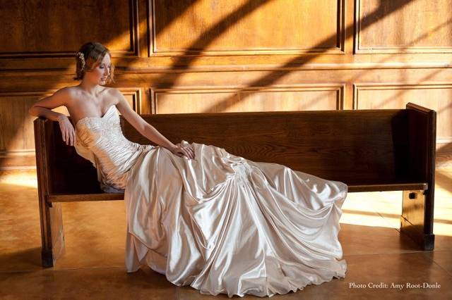 Bride sitting on a bench