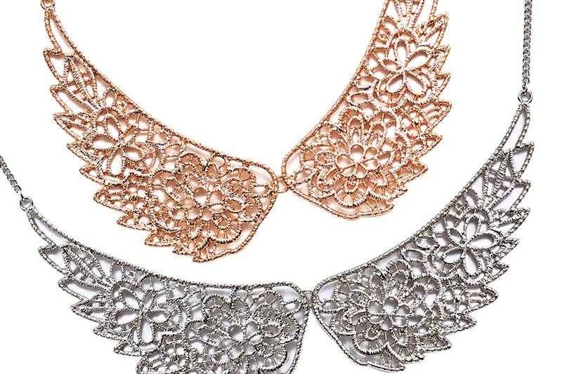 Angel Necklace - $63.00
Two lacy filigree wings spread to fashion a rose gold collar necklace. 16”+3”ext. A lacy pair of rhodium silver filigree wings fashion this stunning collar to wear at the base of your neckline. 16”+3”ext.