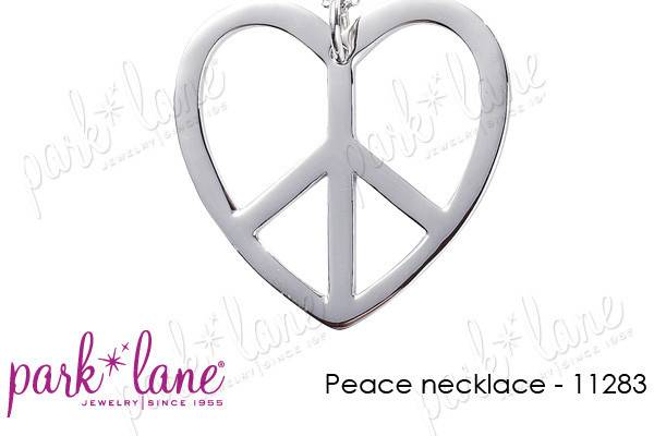 Peace Necklace
Sixty's hippie or today's fashion hip, we all want PEACE! Suspended from its 24-inch long chain, a traditional PEACE sign nestles within a bright silver, heart-shaped frame. Looks great worn over a long top or tunic or can be layered with other necklaces and chains. For peace-lovers everywhere, PEACE necklace! Necklace chain is 24 inches long plus a 3-inch extension. Pendant is almost 2 inches in diameter.