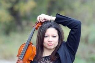 Musician posing with violin