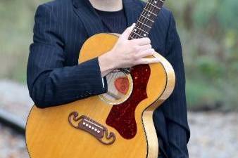 Musician holding guitar